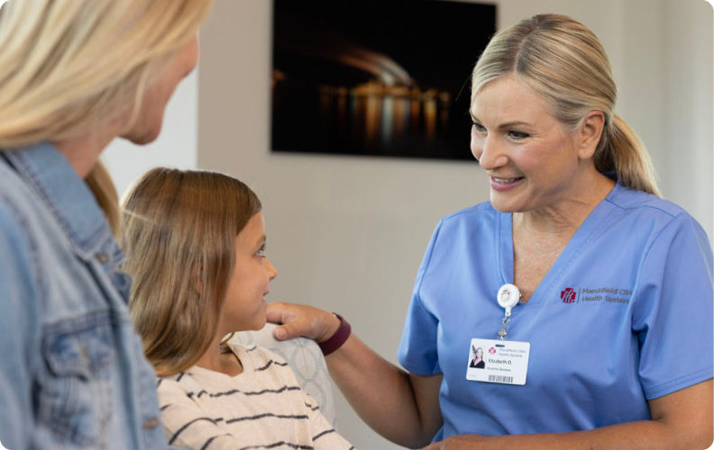 doctor with mom and child