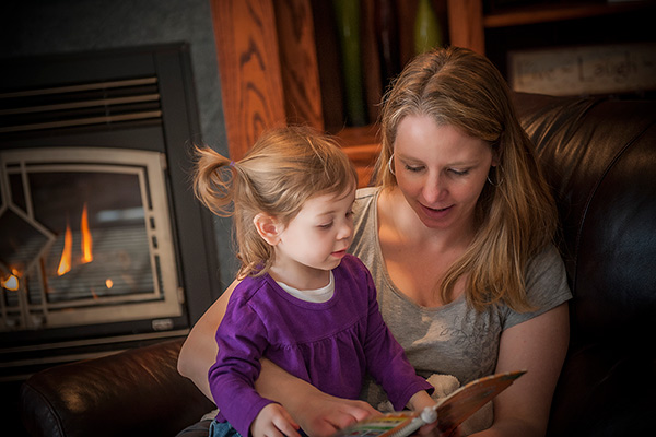 woman reading to child